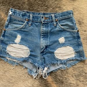 DISTRESSED WRANGLER SHORTS
